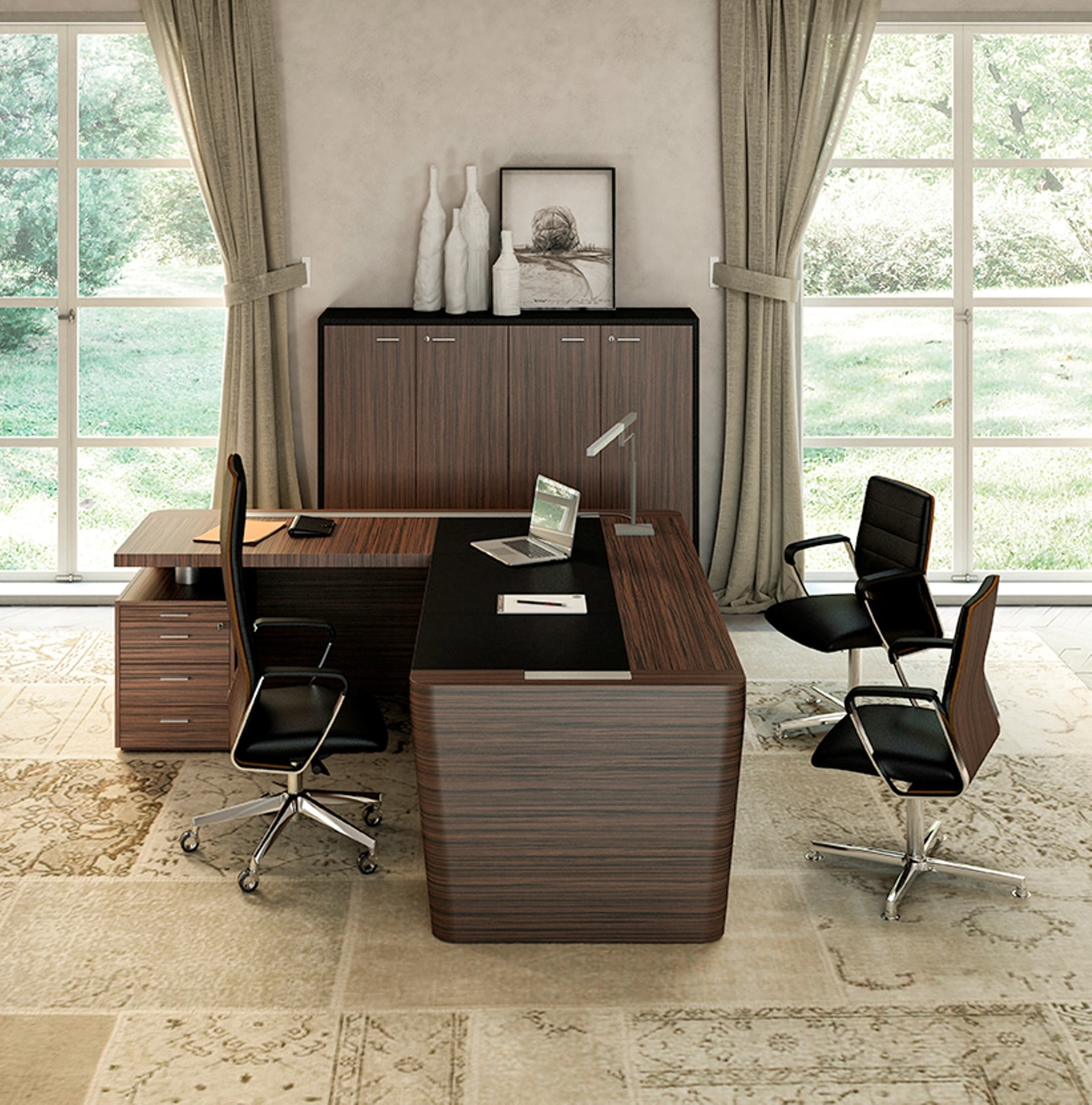 A dark wood corner desk in a relaxed office setting